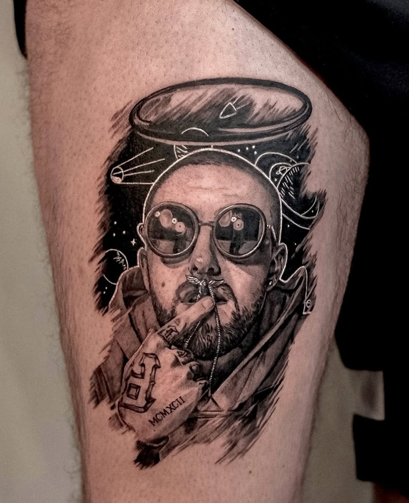 detailed mac miller black and grey tattoo on white skin