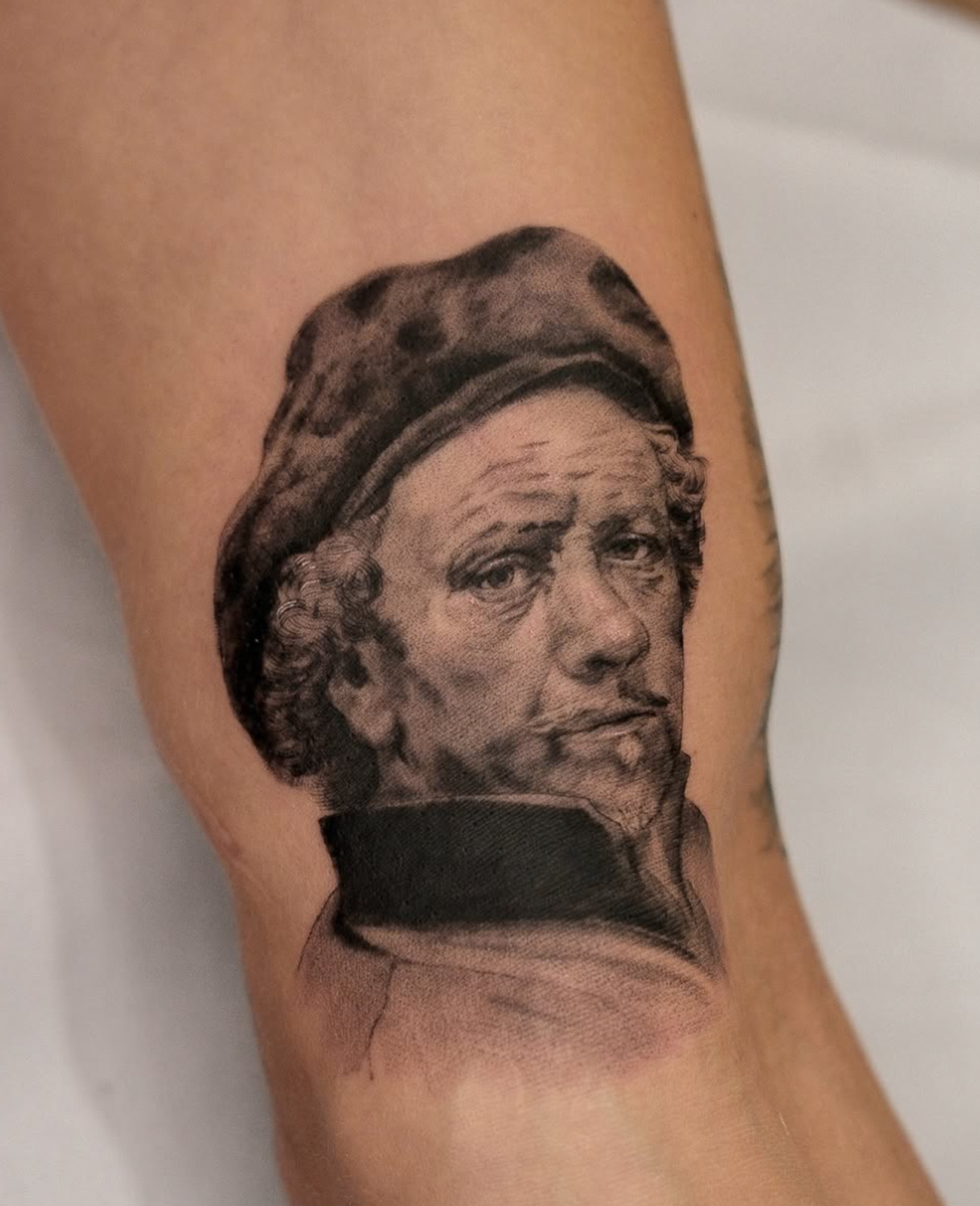 Rembrandt portrait tattoo black and grey realism